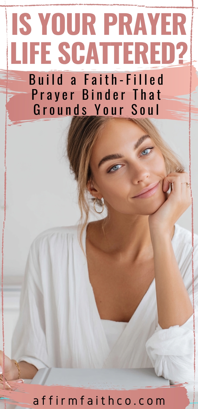 A blonde woman with blue eyes smiles gently while resting her chin on her hand. She sits in front of a white desk with a closed prayer binder. The pink and white text reads: “Is Your Prayer Life Scattered? Build a Faith-Filled Prayer Binder That Grounds Your Soul” with a rose-toned paint stroke design. The URL affirmfaithco.com is at the bottom.