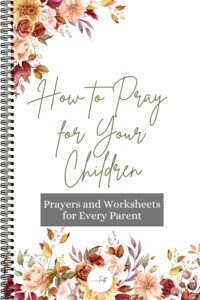 An image of a spiral-bound book cover titled How to Pray for Your Children with floral designs at the top and bottom and a subtitle reading Prayers and Worksheets for Every Parent.